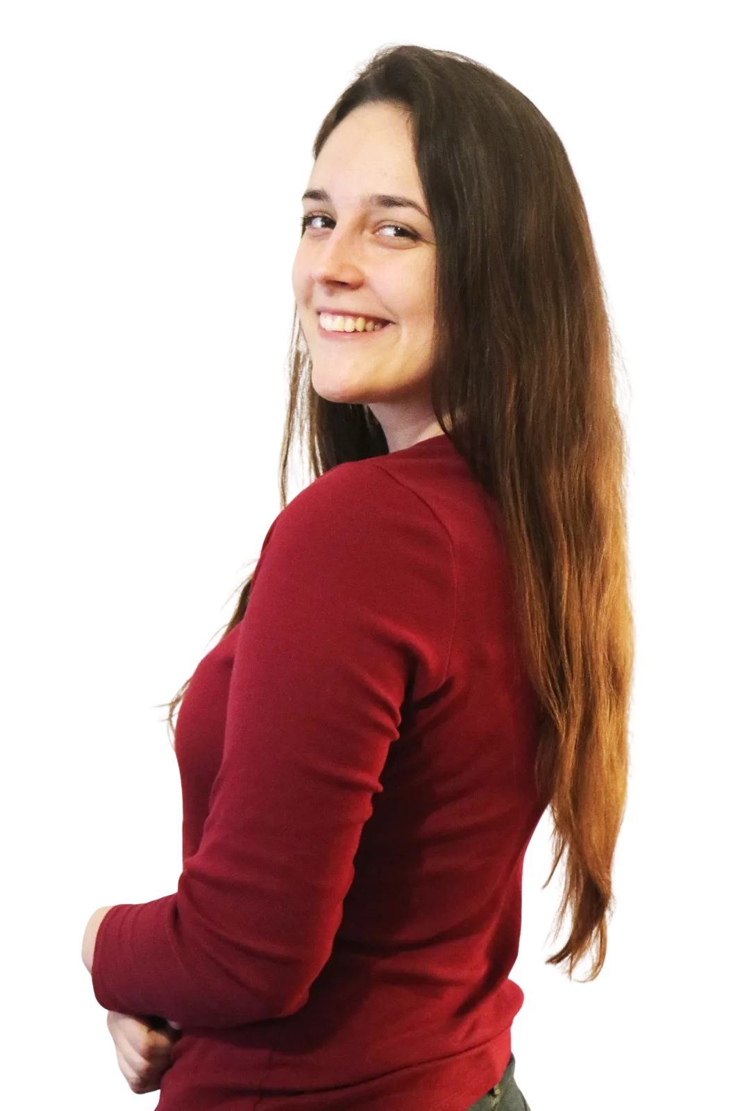 Stela Nemčev, digital marketing specialist and video editor, smiling over her shoulder